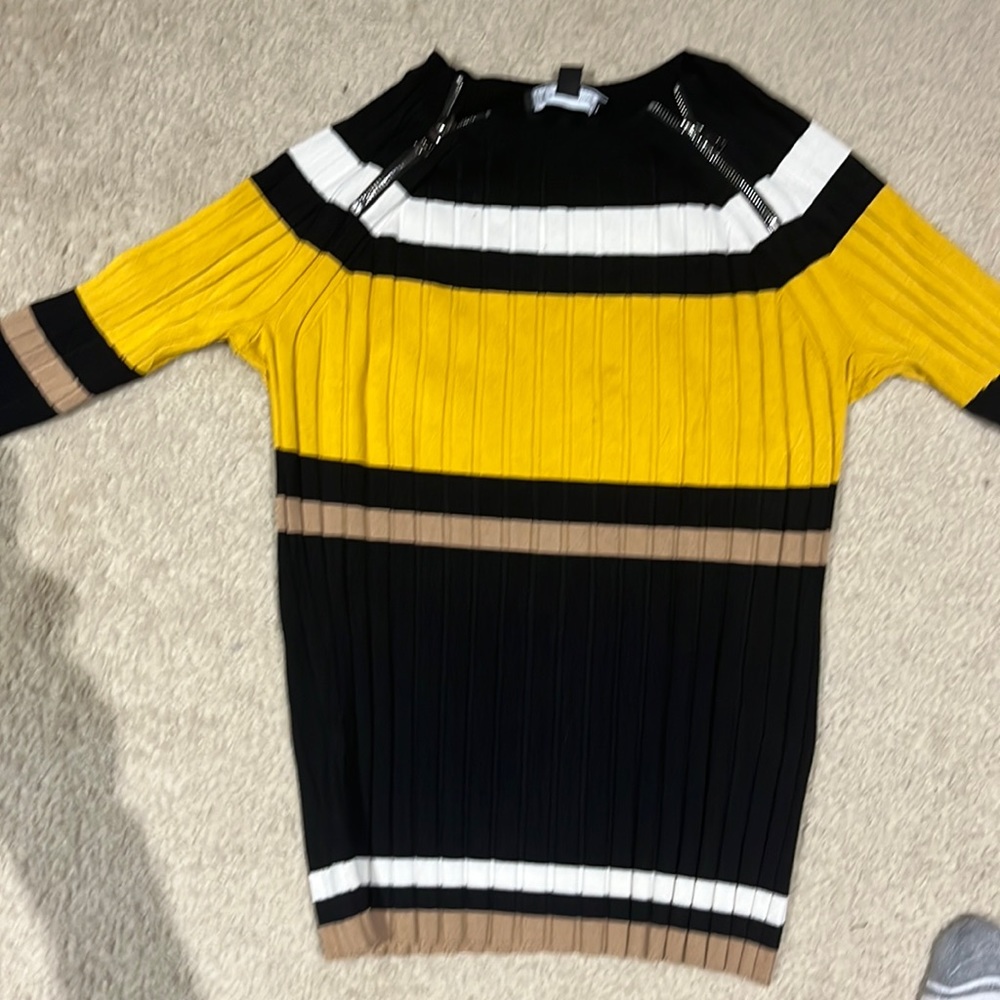 Great shirt with jeans or dress pants. Made out of rayon and nylon.